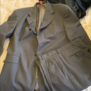 Olive green (tan) 4 button suit. 2 piece
